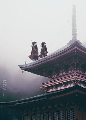 Itachi and Kisame Uchiha Standing on a Misty Japanese Temple Roof in Naruto Shippuden HD phone wallpaper