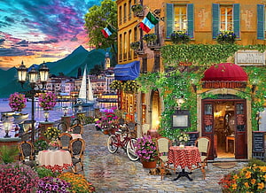 Charming Italian Waterfront Street Scene with Restaurant and Sailboat at Sunset HD wallpaper