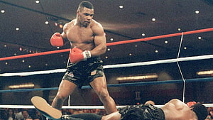 Mike Tyson in the Ring During a Historic Boxing Match HD wallpaper