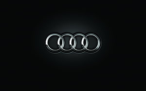 Audi Four Interlocking Rings Emblem on Dark Background HD wallpaper