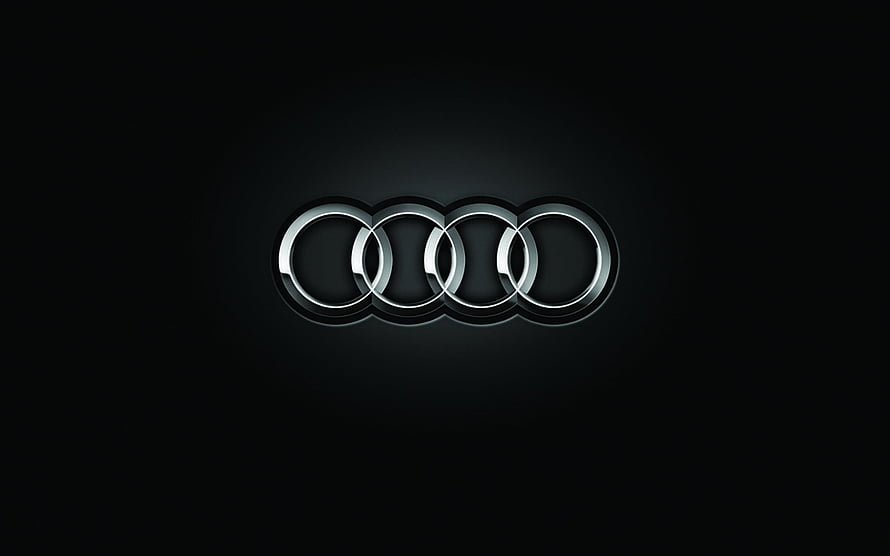 Audi Four Interlocking Rings Emblem on Dark Background HD wallpaper
