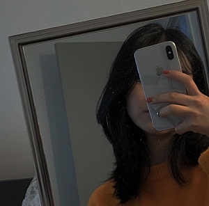 Moody Mirror Selfie of a Woman with Dark Hair Holding a Silver Smartphone, ulzzang #koreangirl. Girls mirror, Mirror selfie, Ulzzang girl HD wallpaper