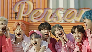 BTS Members Laughing Together in Vibrant Pink Outfits HD wallpaper