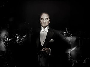 Mustafa Kemal Ataturk in Formal Black Tie Attire with Dramatic Dark Background HD wallpaper