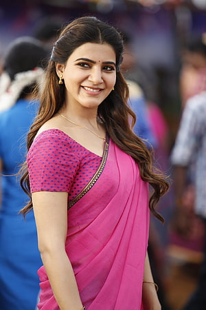 Samantha Akkineni in a vibrant pink sari with gold jewelry and a warm smile HD phone wallpaper