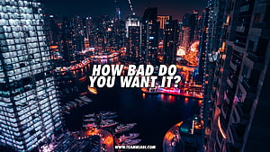 Aerial Night View of Dubai Marina with Illuminated Skyscrapers and Yachts HD wallpaper