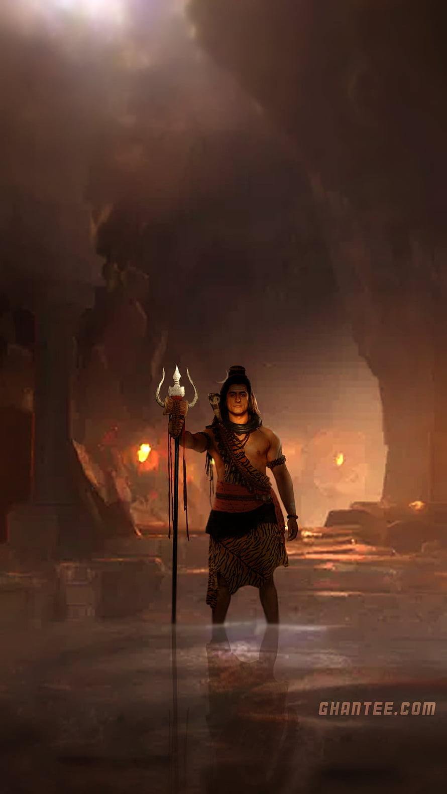 Bhola Baba warrior figure holding a trident in a dark cavern with glowing embers and dramatic lighting HD phone wallpaper