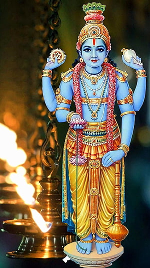 Lord Vishnu Divine Statue Holding Conch And Chakra With Oil Lamps HD phone wallpaper