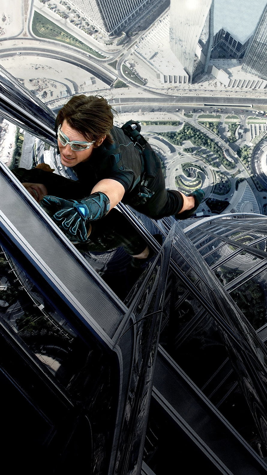 Ethan Hunt scaling the Burj Khalifa in Mission Impossible Ghost Protocol HD phone wallpaper
