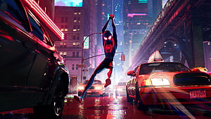 Miles Morales swinging through a neon-lit rainy city street in Spider-Man: Into the Spider-Verse HD wallpaper