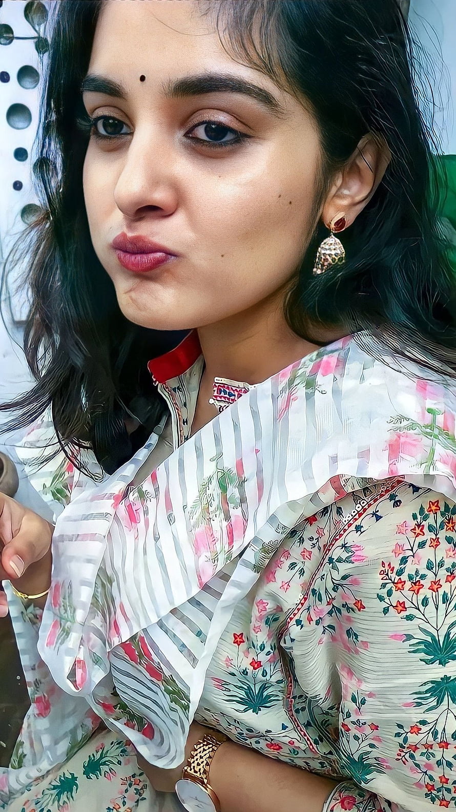 Nivetha Thomas in Floral Ethnic Wear with Traditional Jhumka Earrings HD phone wallpaper