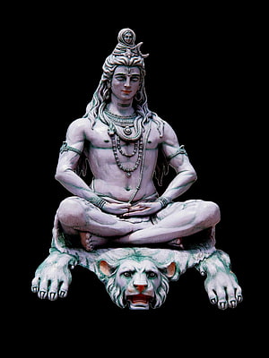 Lord Shiva Meditating on a Lion in a Serene Sculpture Style HD phone wallpaper