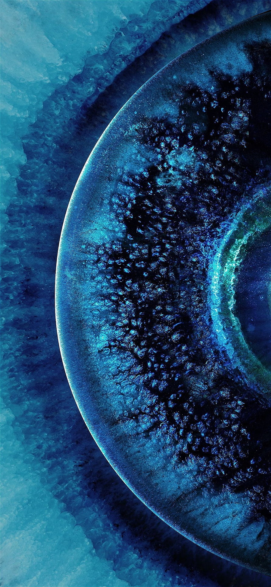 Abstract Blue Ice Texture with Dark Circular Form and Glowing Rim HD phone wallpaper