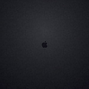 Minimalist Apple Logo on Dark Textured Surface HD phone wallpaper