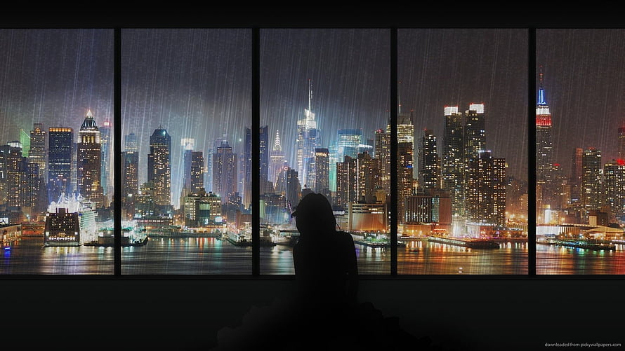 Silhouette of a Woman Gazing at the Rainy New York City Skyline at Night HD wallpaper