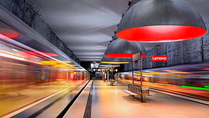 Lenovo Branded Subway Station With Motion Blur Trains and Red Dome Lights HD wallpaper