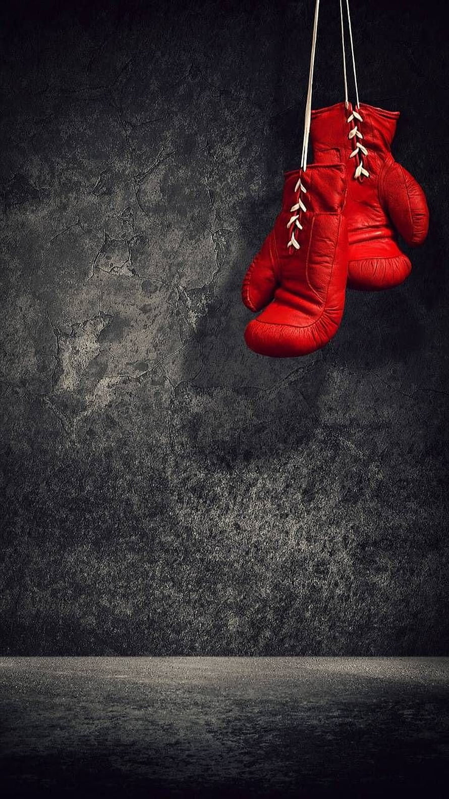 Red Boxing Gloves Hanging Against Dark Grunge Wall HD phone wallpaper