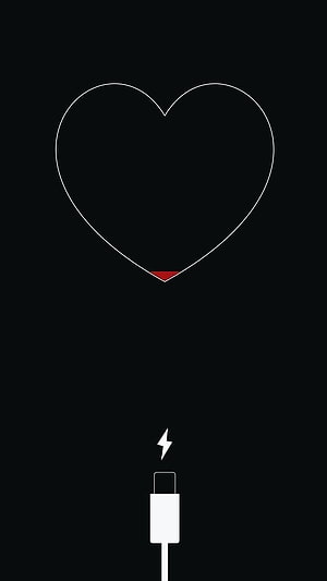 Minimalist Heart Charging Icon on Black Background with Lightning Bolt and USB Cable HD phone wallpaper