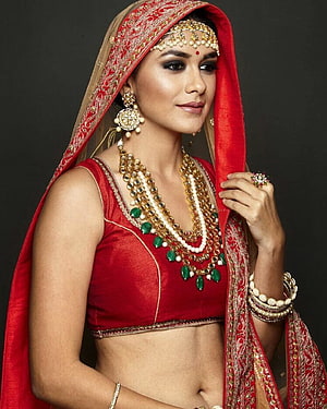 Mrunal Thakur in Traditional Red Bridal Lehenga with Gold Jewelry and Embroidered Dupatta HD phone wallpaper