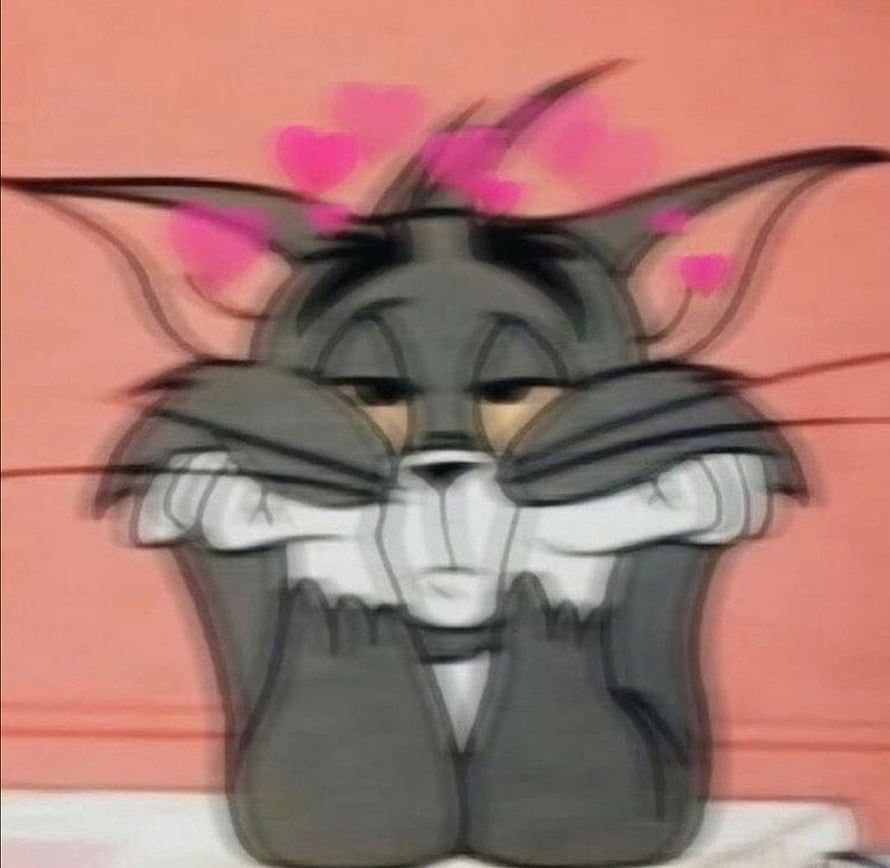 Tom from Tom and Jerry in a dreamy aesthetic pose with floating pink hearts HD wallpaper