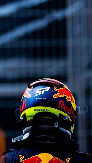 Sergio Perez Red Bull Racing Helmet Close-Up with Never Give Up Slogan HD phone wallpaper