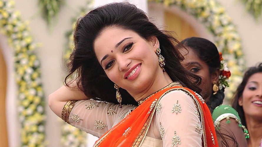 Tamanna Bhatia in Traditional Indian Attire with Floral Background HD wallpaper