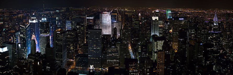 Aerial Night View of Manhattan Skyline with Illuminated Skyscrapers and City Lights HD wallpaper