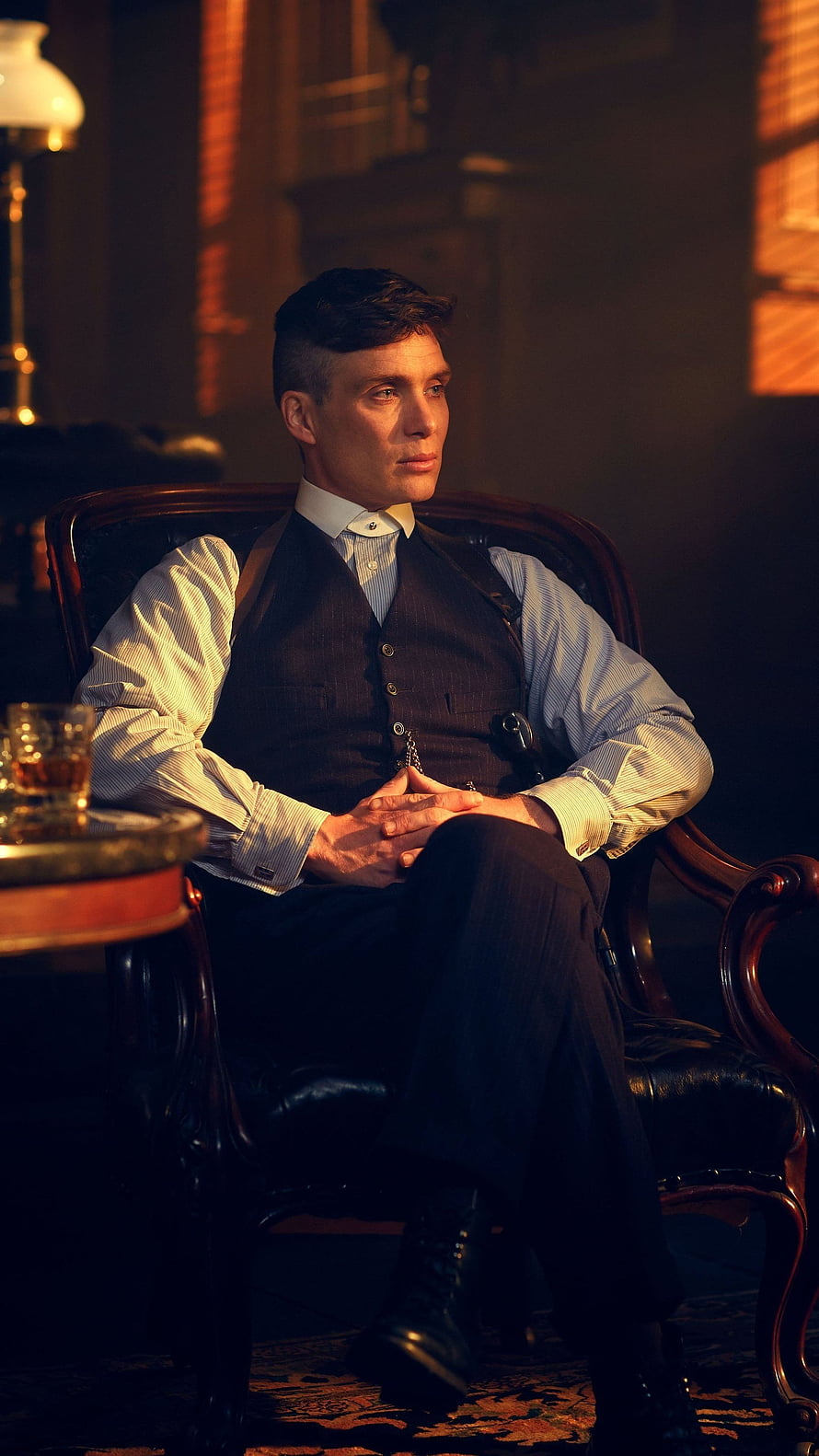 Cillian Murphy as Thomas Shelby in Peaky Blinders seated in a dimly lit vintage study HD phone wallpaper