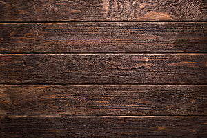 Dark Rustic Wood Plank Texture with Prominent Grain Patterns and Natural Knots HD wallpaper