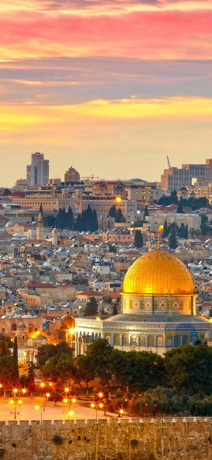 Dome of the Rock in Jerusalem at sunset with golden sky and city skyline HD phone wallpaper