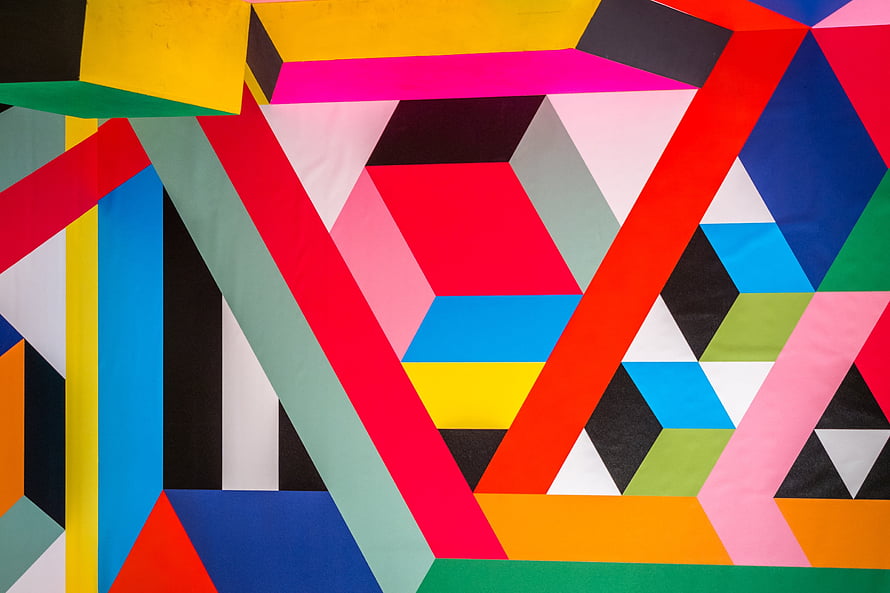 Vibrant Geometric Abstract Art with Bold Colorful Shapes and Triangular Patterns HD wallpaper
