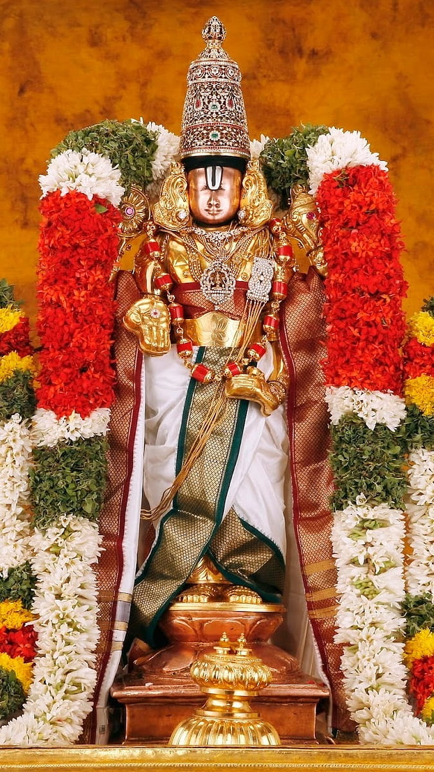 Lord Venkateswara Swamy Deity Adorned in Gold and Flower Garlands HD phone wallpaper