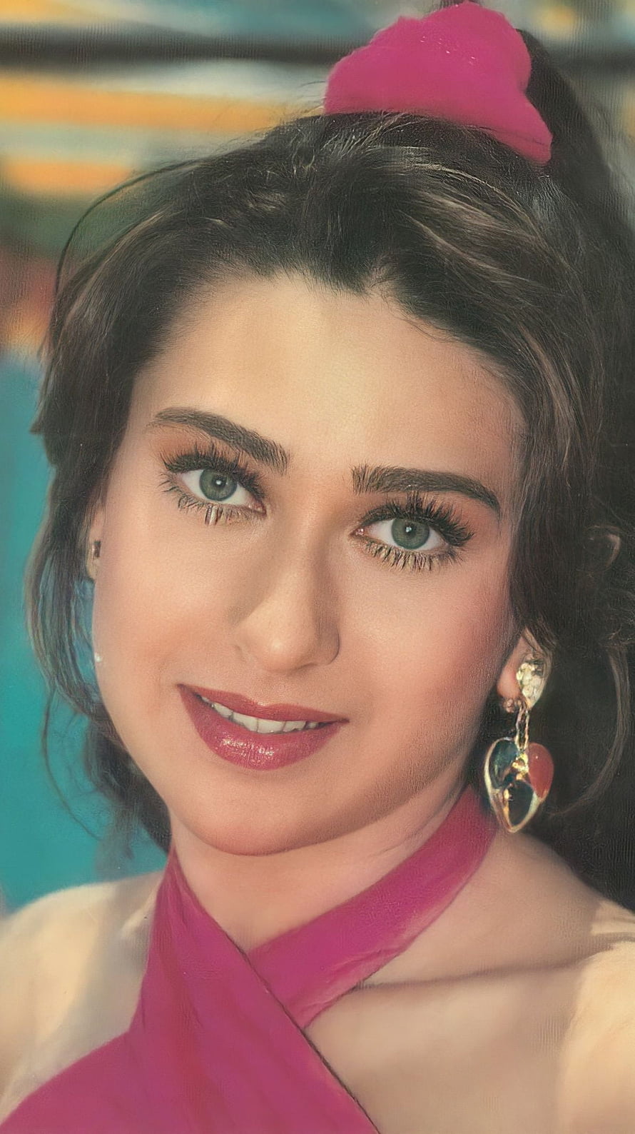 Karishma Kapoor Portrait With Pink Hair Accessory And Heart-Shaped Earrings HD phone wallpaper