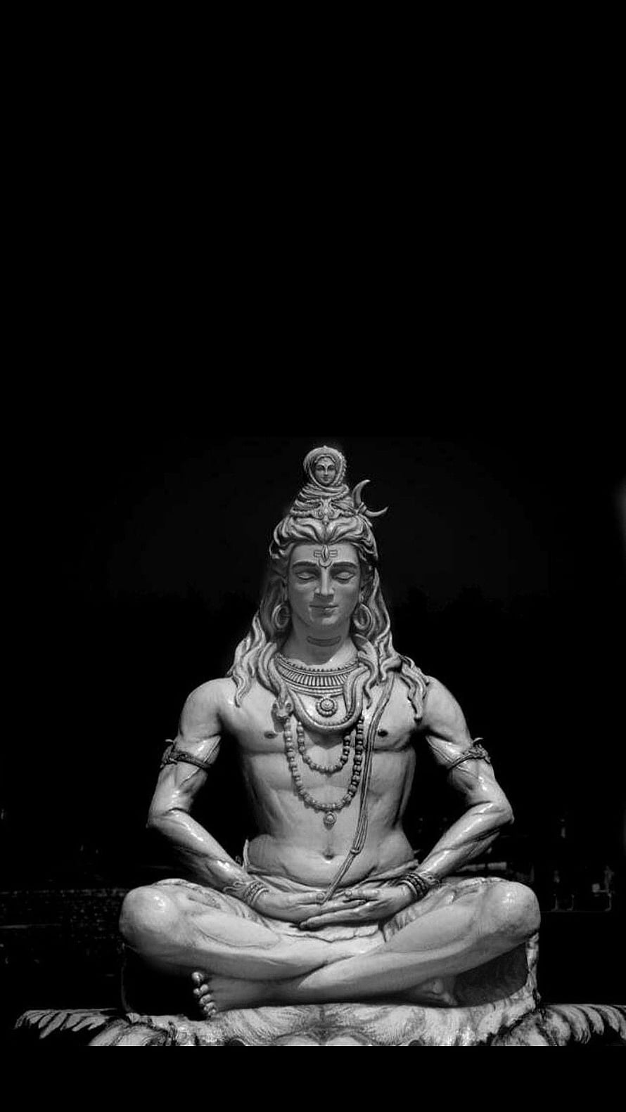 Lord Shiva Meditating in Lotus Pose with Serene Expression and Traditional Adornments HD phone wallpaper