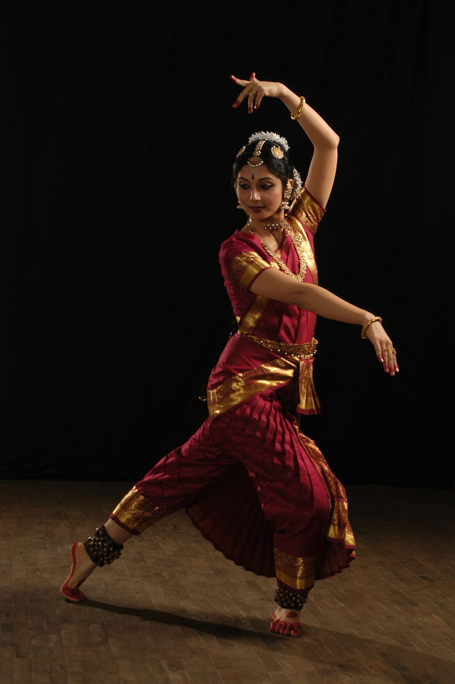 Bharatanatyam Dancer in Traditional Maroon and Gold Costume Performing Classical Indian Dance HD phone wallpaper