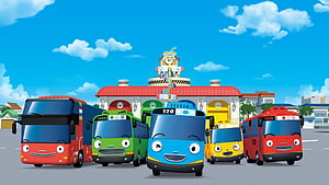 Tayo and Friends Animated Buses in Front of Colorful Bus Depot HD wallpaper