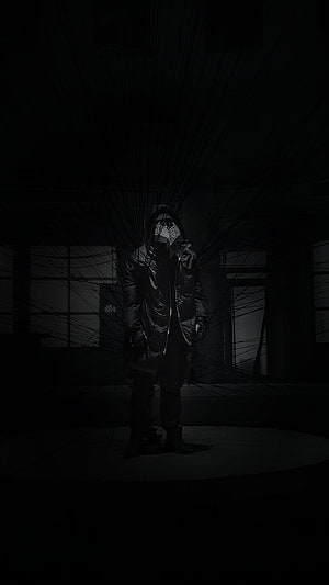Ziak Drill Artist in Dark Industrial Setting with Radiating Lines HD phone wallpaper