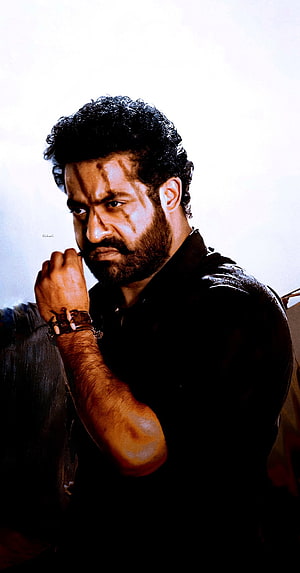 Jr NTR as Bheem in RRR Intense Portrait with Dark Beard and Black Shirt HD phone wallpaper