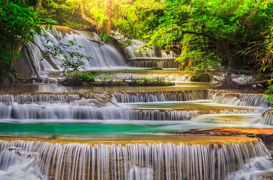 Erawan Waterfalls in Thailand: Turquoise Tiers and Lush Forest Canopy HD wallpaper