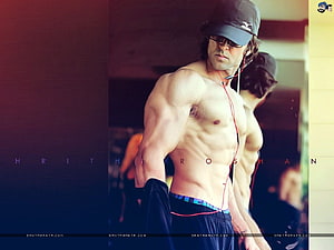 Hrithik Roshan shirtless in Krrish 3 with cap and earphones HD wallpaper