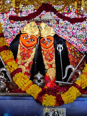 Chamunda Maa Temple Deities Adorned in Gold Crowns and Marigold Garlands HD phone wallpaper