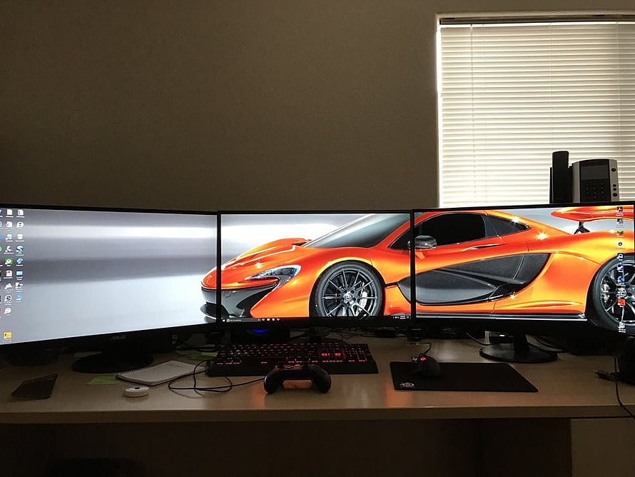 Triple Monitor Gaming Setup Featuring Orange McLaren P1 Wallpaper HD wallpaper