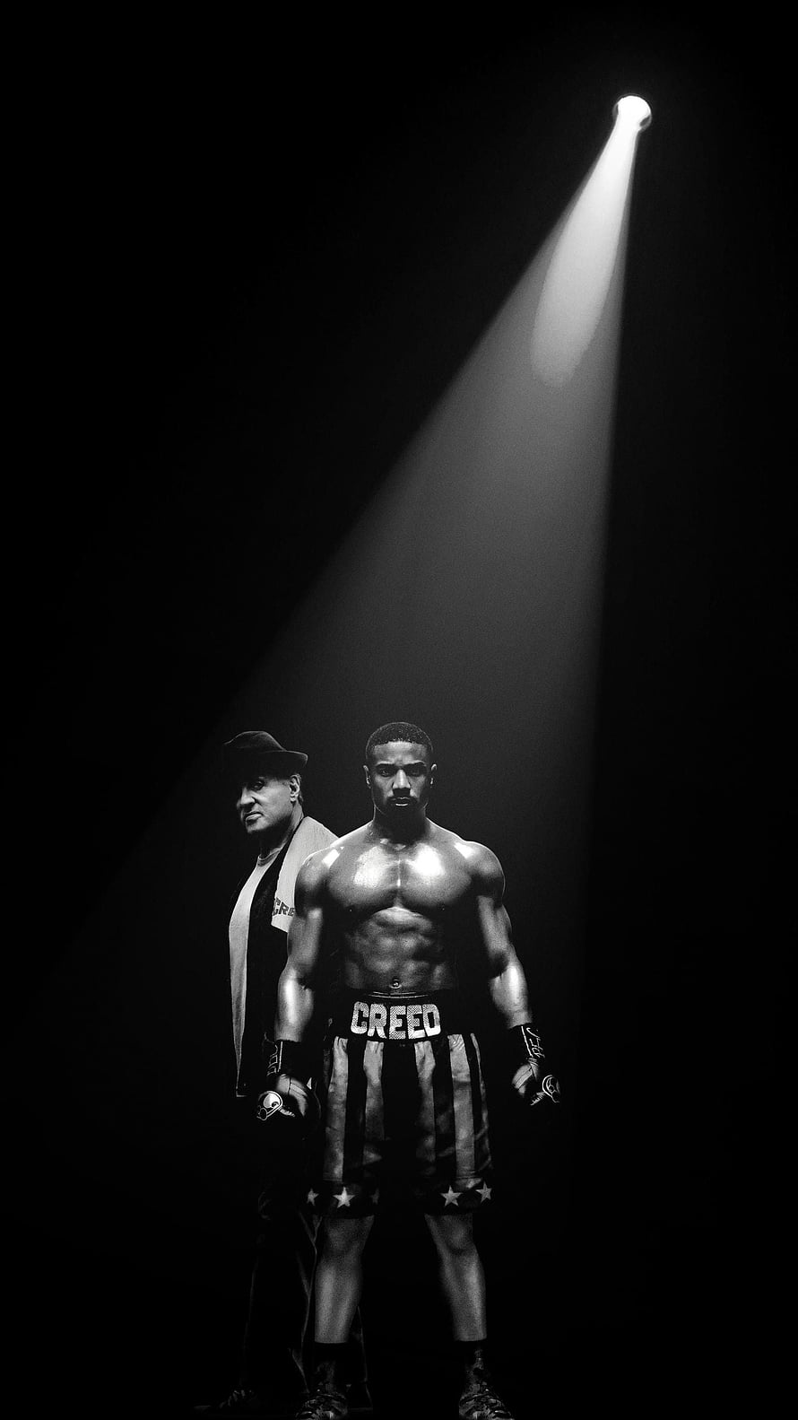 Creed II Black and White Boxing Scene with Rocky Balboa and Adonis Creed Under Spotlight HD phone wallpaper