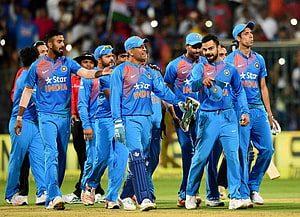 Indian Cricket Team Players Walking On Field In Blue Star India Uniforms HD wallpaper