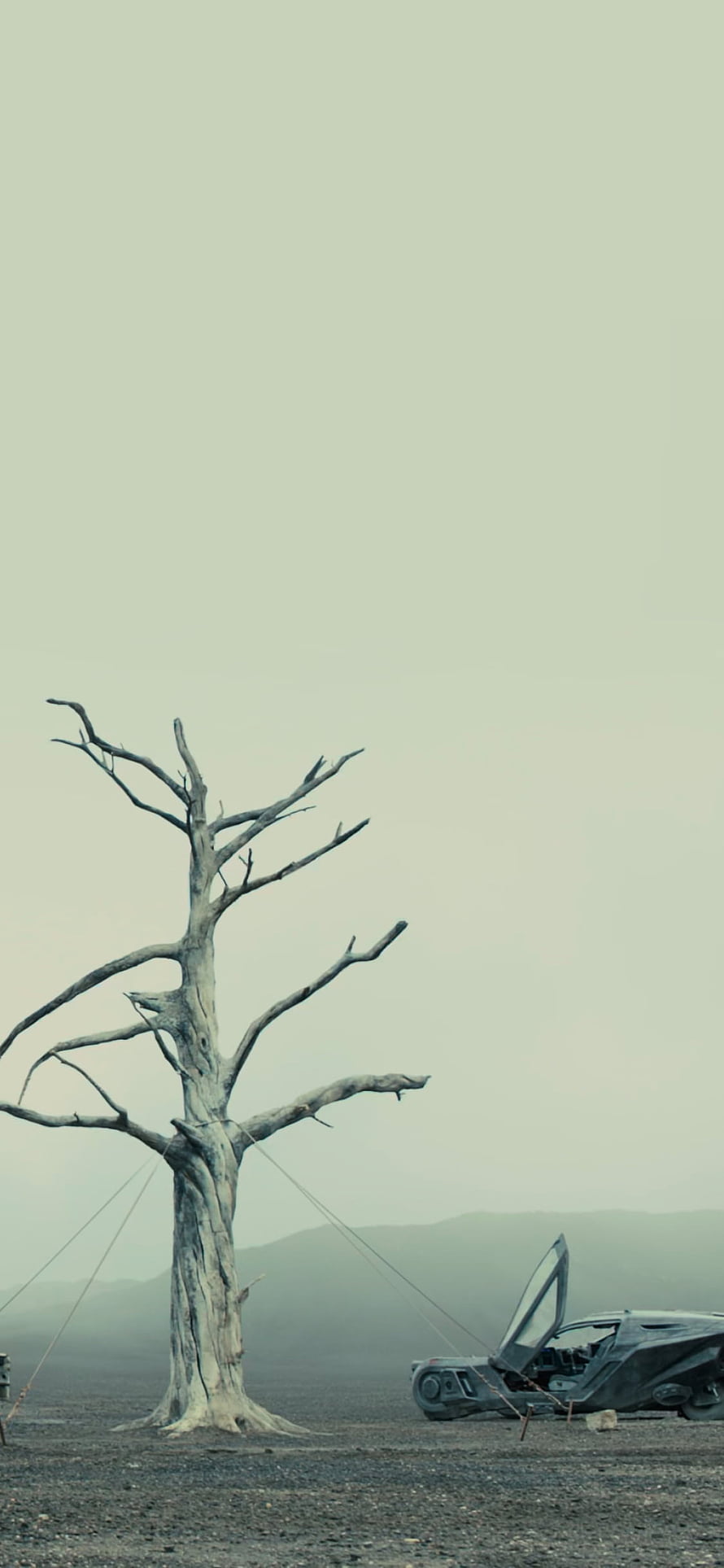 Blade Runner 2049 Wasteland Scene with Dead Tree and Futuristic Vehicle HD phone wallpaper