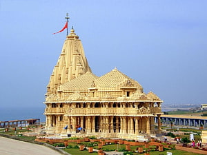 Somnath Temple in Gujarat India: Golden Sandstone Architecture and Coastal Landscape HD wallpaper