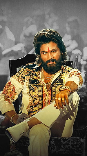 Allu Arjun as Pushpa in ornate gold and white costume with red forehead mark HD phone wallpaper