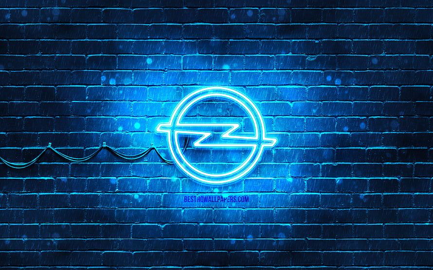 Glowing Blue Opel Neon Emblem Mounted on a Dark Brick Wall at Night HD wallpaper