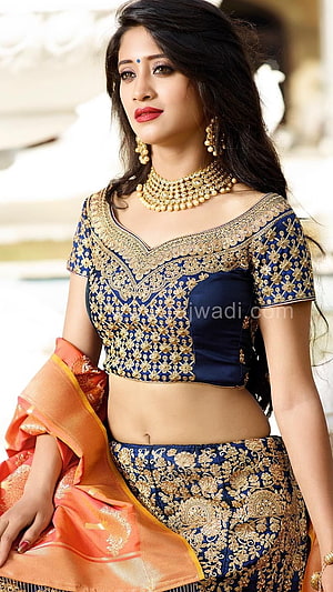 Shivangi Joshi in Navy Blue and Gold Embroidered Lehenga with Orange Dupatta HD phone wallpaper
