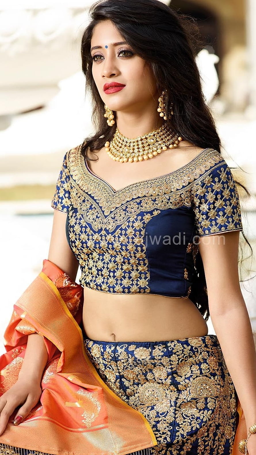 Shivangi Joshi in Navy Blue and Gold Embroidered Lehenga with Orange Dupatta HD phone wallpaper